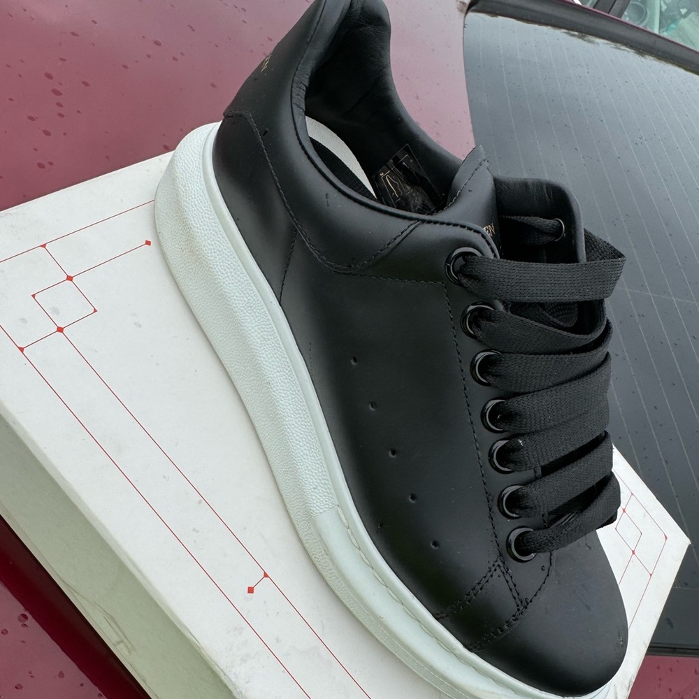 Black Alexander McQueen designer tennis shoe